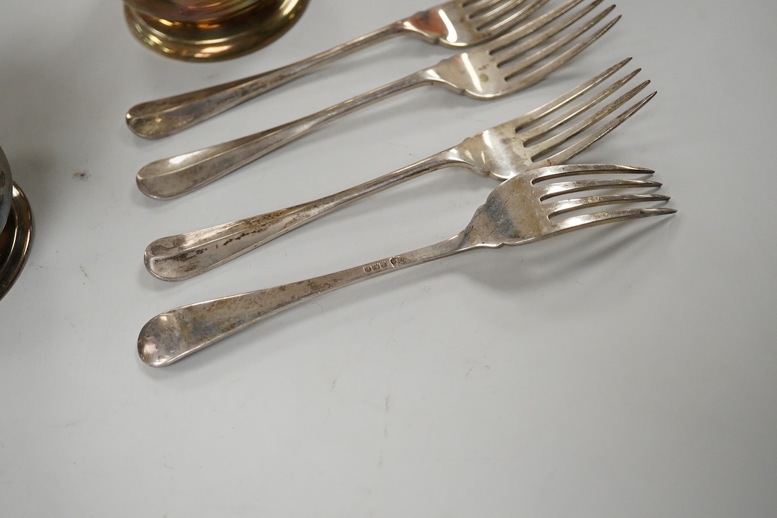 Two George V silver loving cups, one by Atkin Brothers, Sheffield, 1926, height 89mm and a set of four silver Hanoverian pattern dessert forks, Birmingham, 1930, 16.4oz.